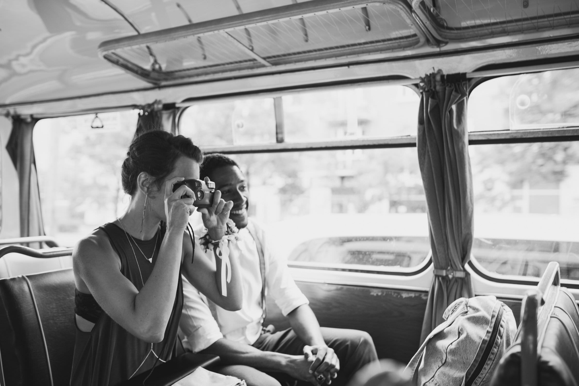 black and white old camera photos in bus