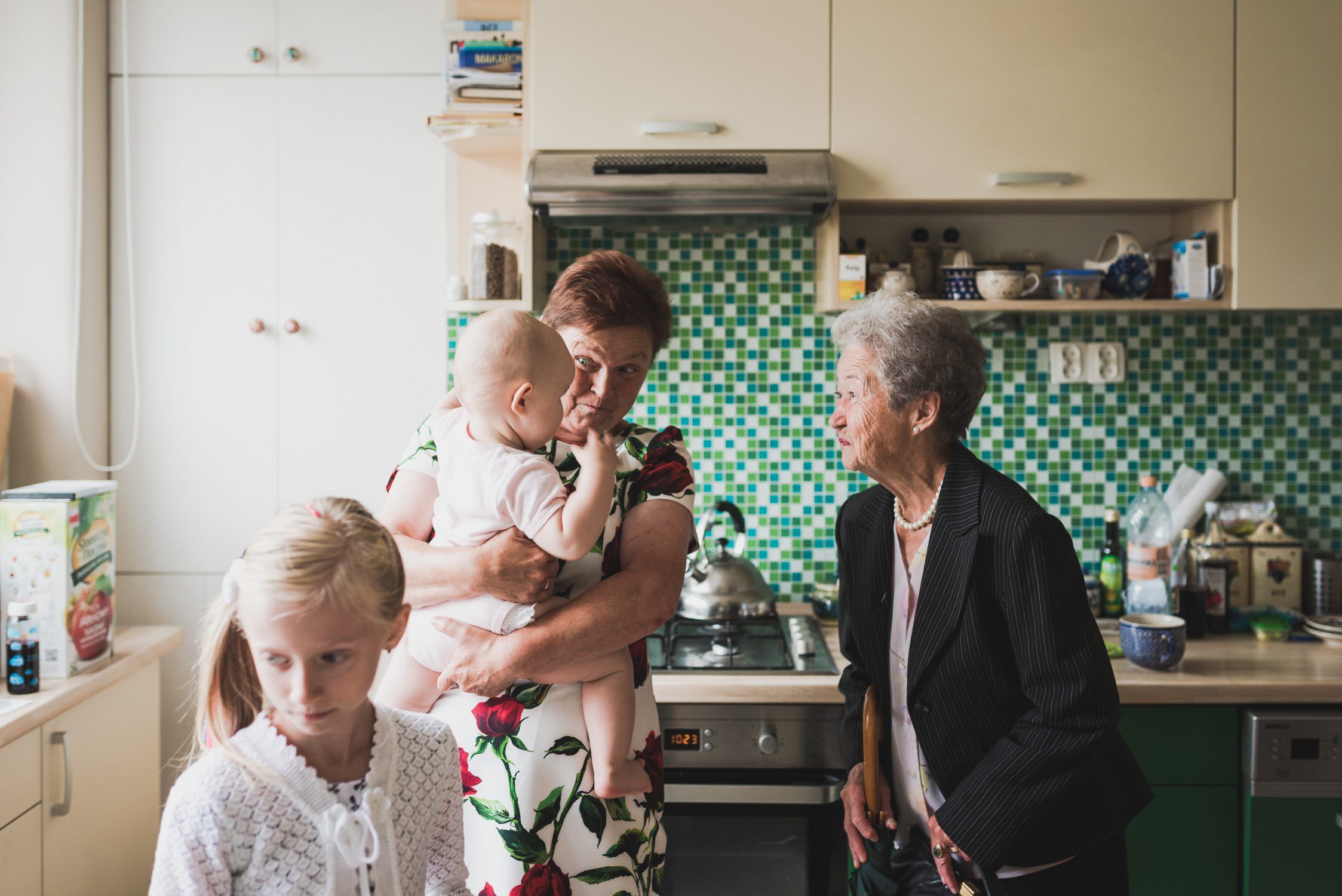 grandmother and kids in kitchen