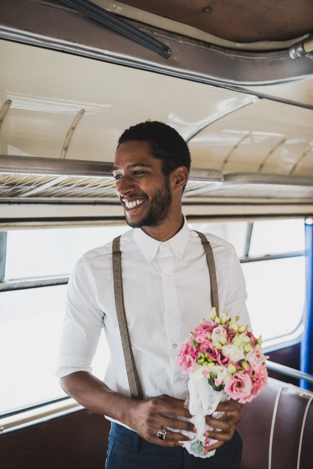 man with the flowers in white shirt