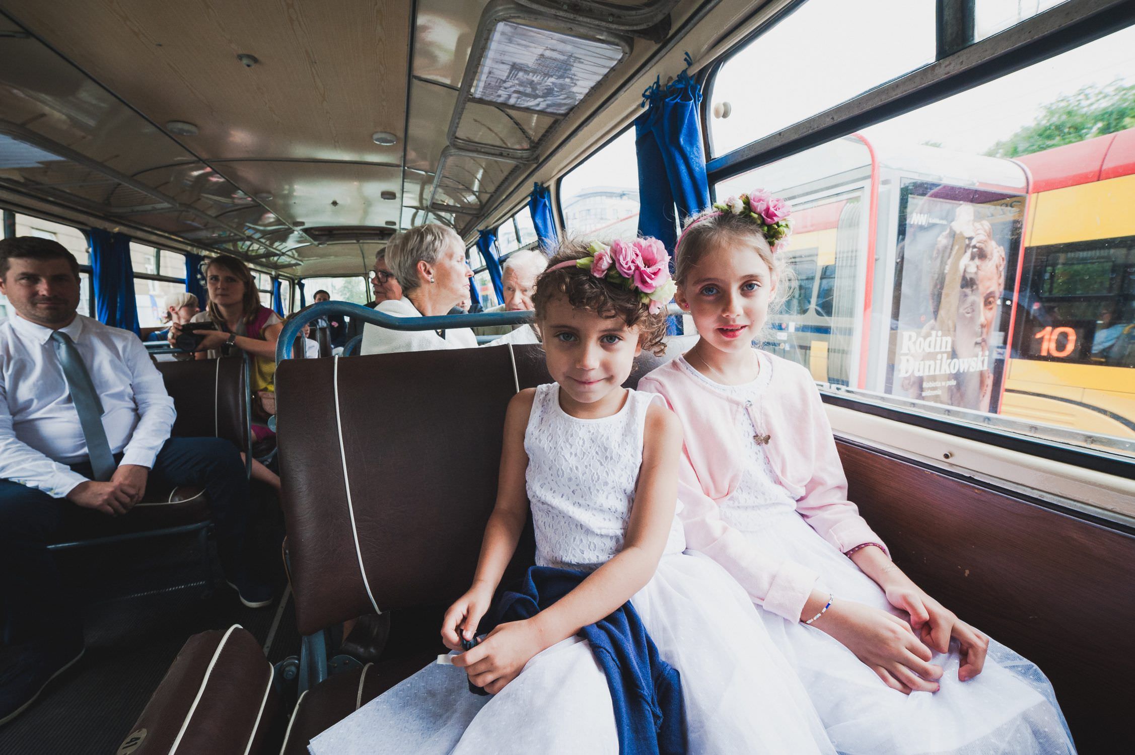 two little girls in white dresses