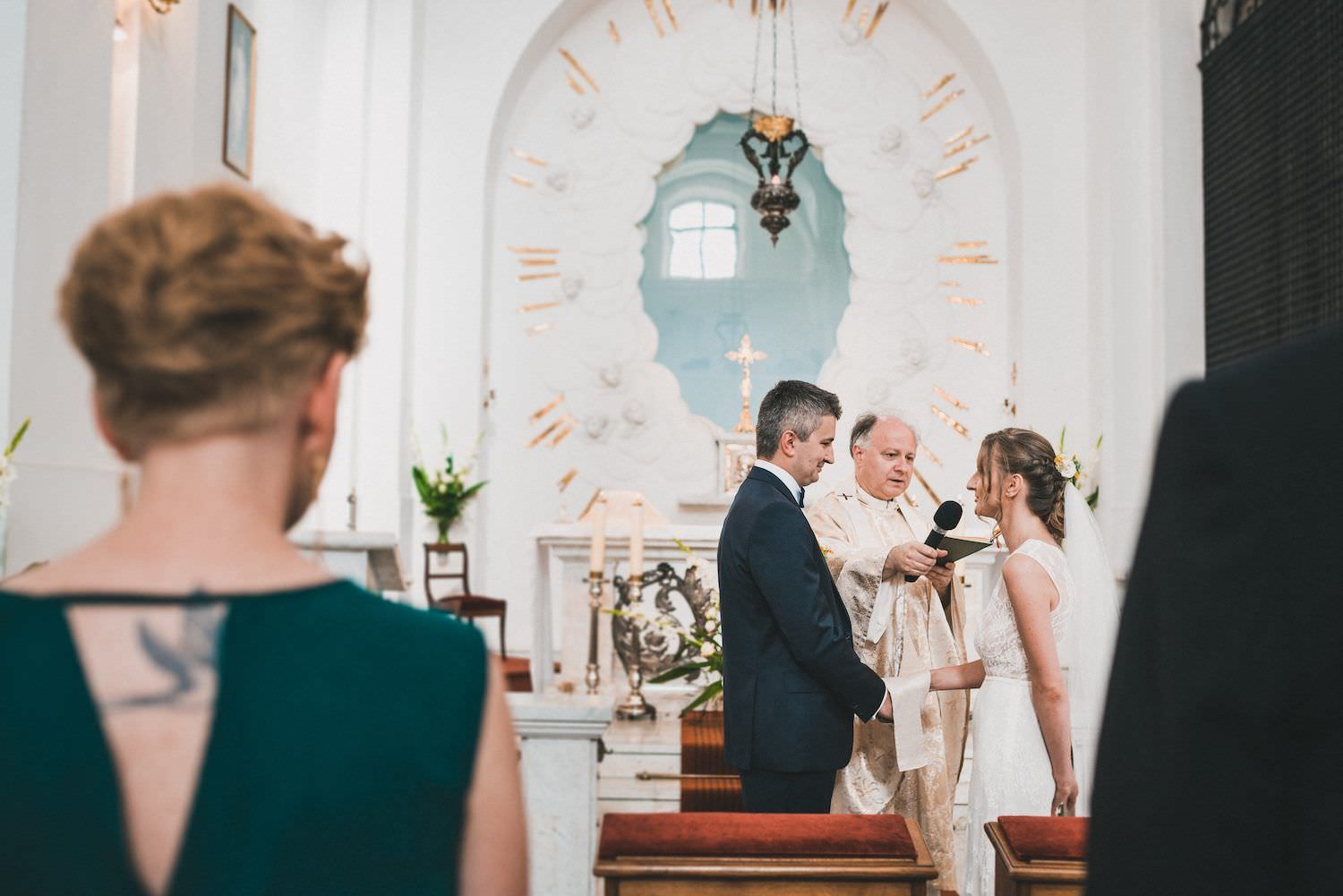 wedding ceremony new town church warsaw white gold priest