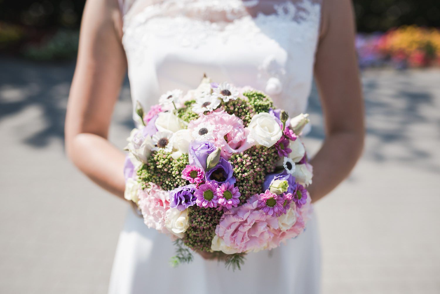 bride with flowers wedding details