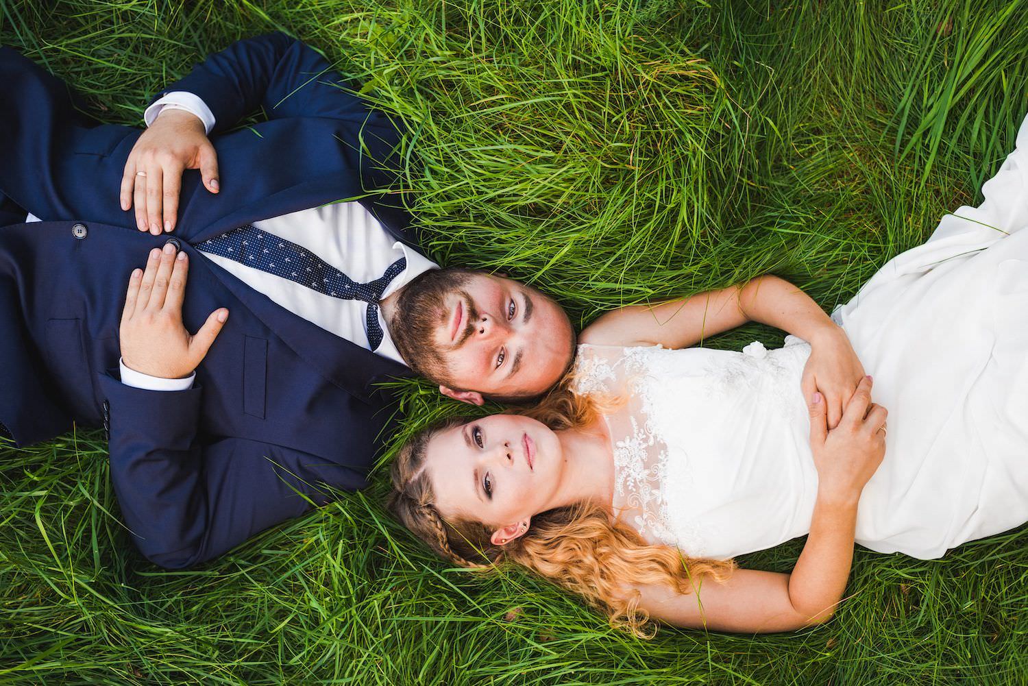 married couple on the grass