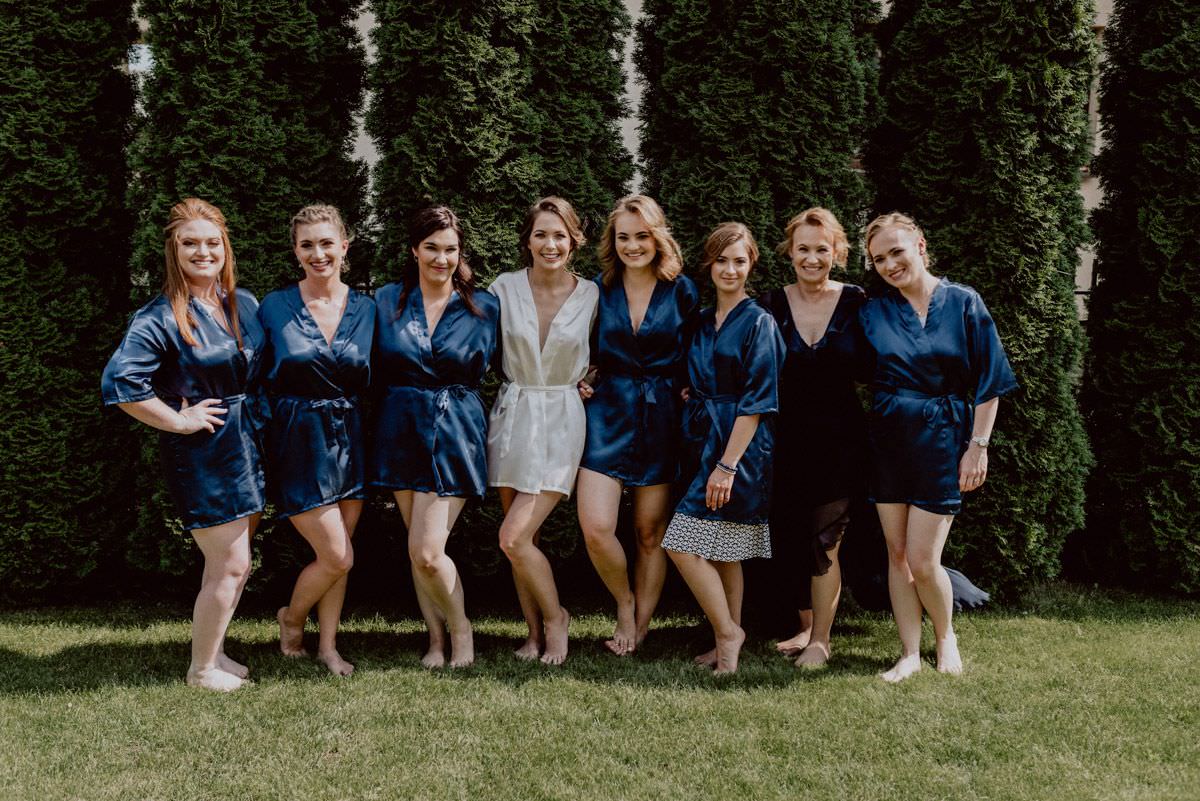 bridesmaids in the garden with bride and her mother