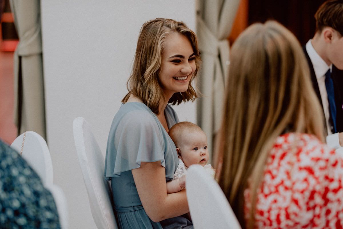 bridesmaid with little child