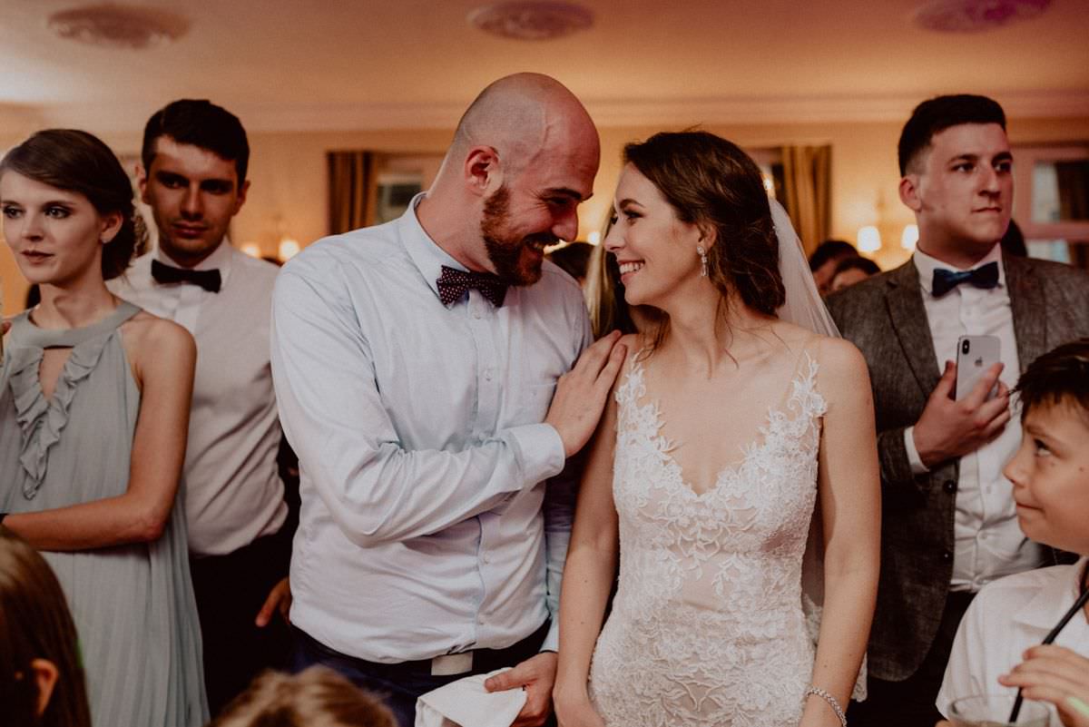 bride is smiling with friend