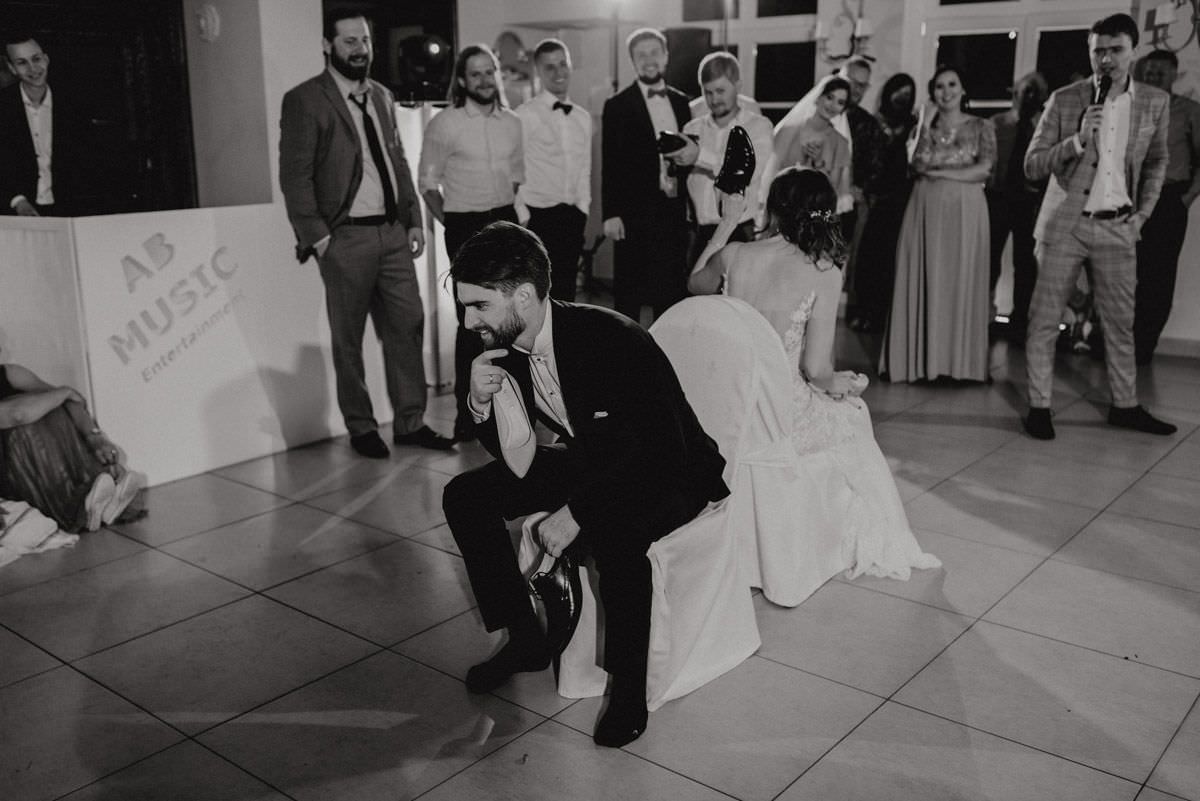 wedding game with married couple shoes black and white photo