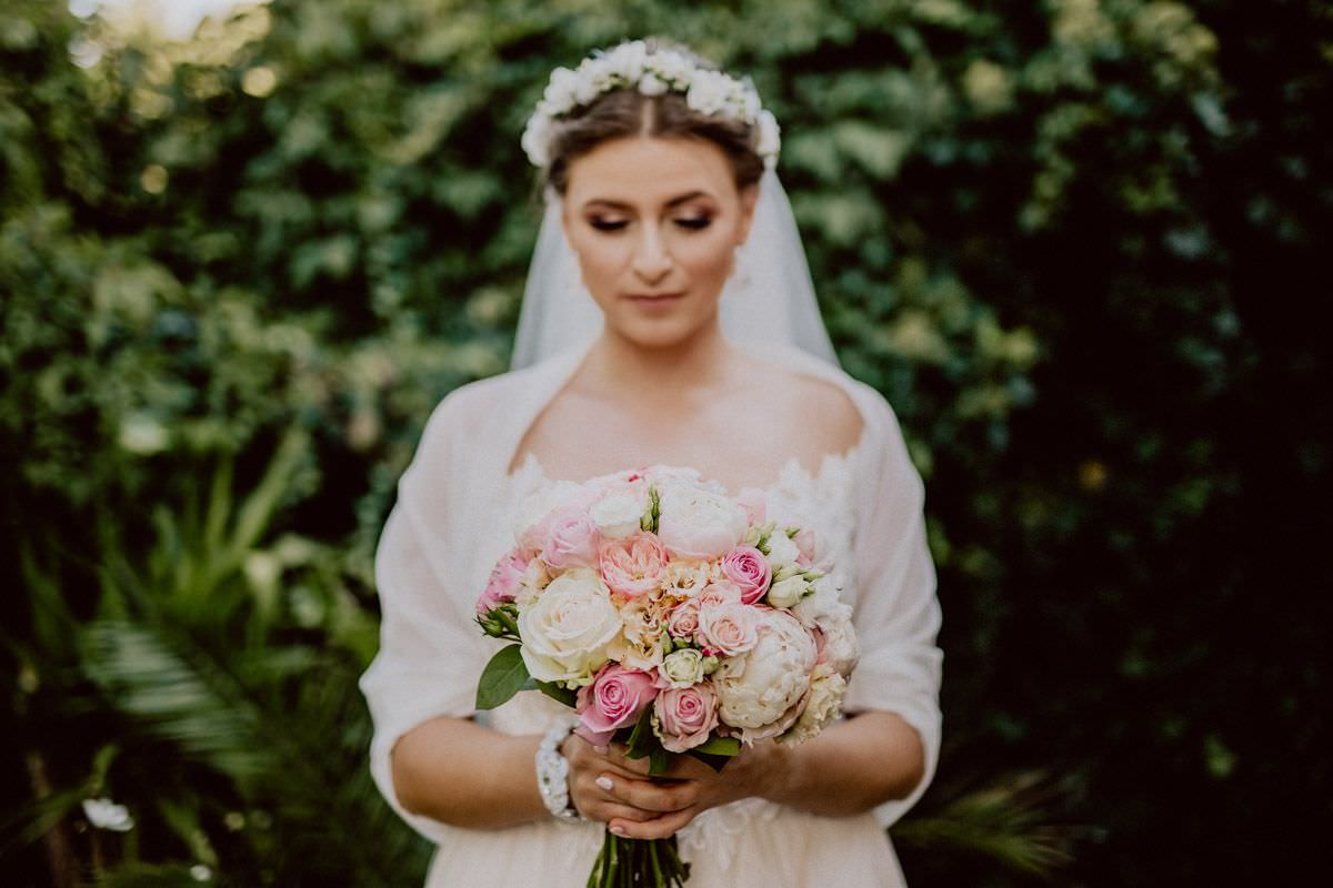 bride with bouquet of flowers