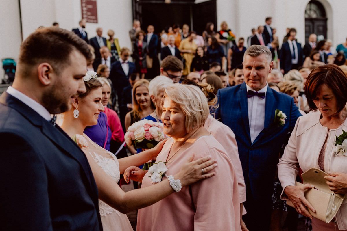 wishes for the bride and groom in front of the church