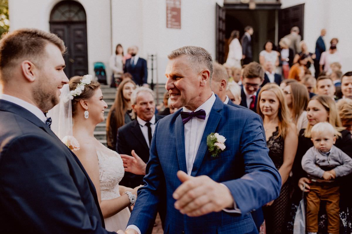 wishes for the bride and groom in front of the church