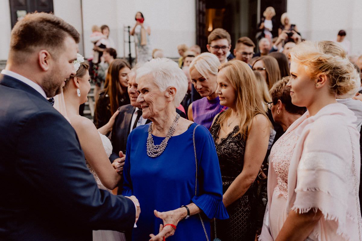 wishes for the bride and groom in front of the church