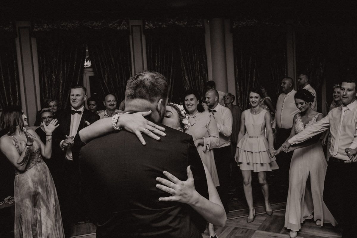 bride kiss the groom and hug him
