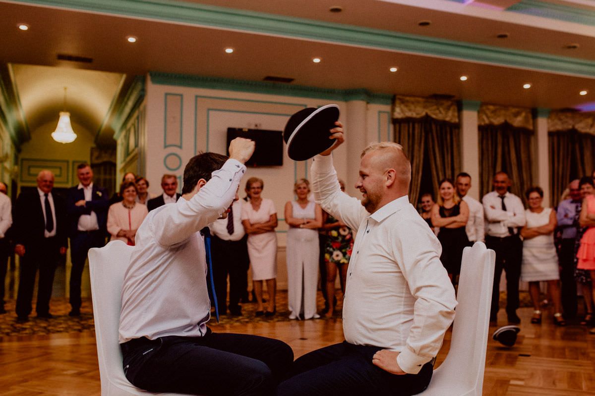 mans playing the game with hats